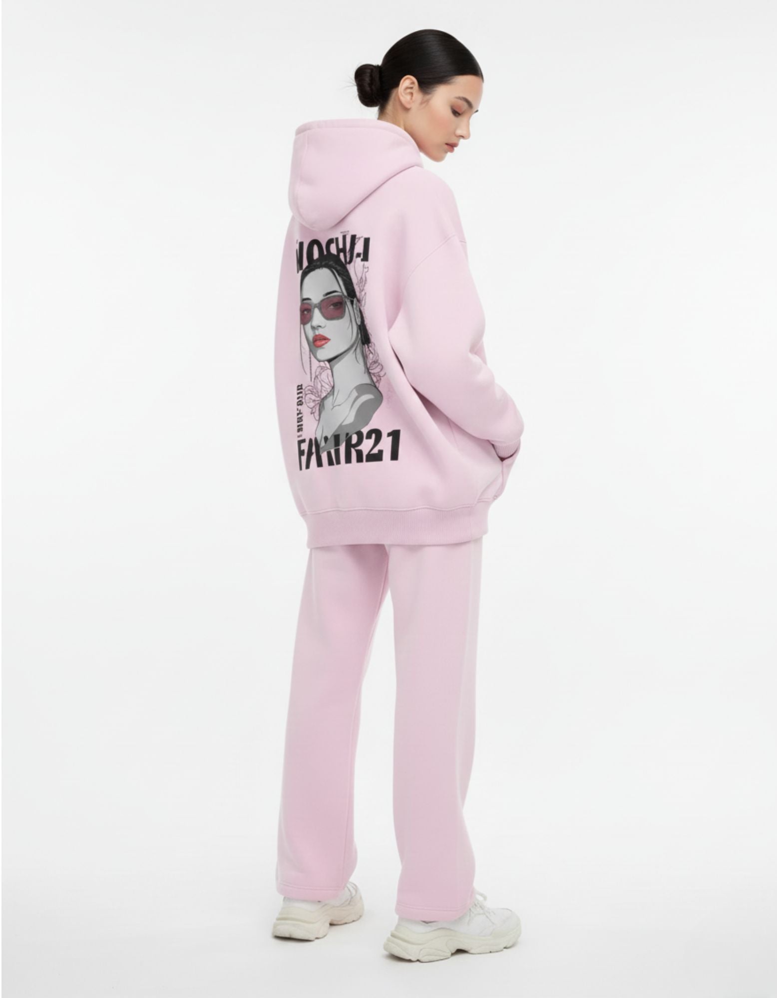 Detailed back view of an aesthetic pink graphic hoodie for women, perfect for a Y2K or streetwear look.