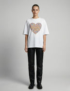 Straight front view of the "Overthinking Club" white t-shirt on a female model, perfect for the "oversized-core" fashion trend.