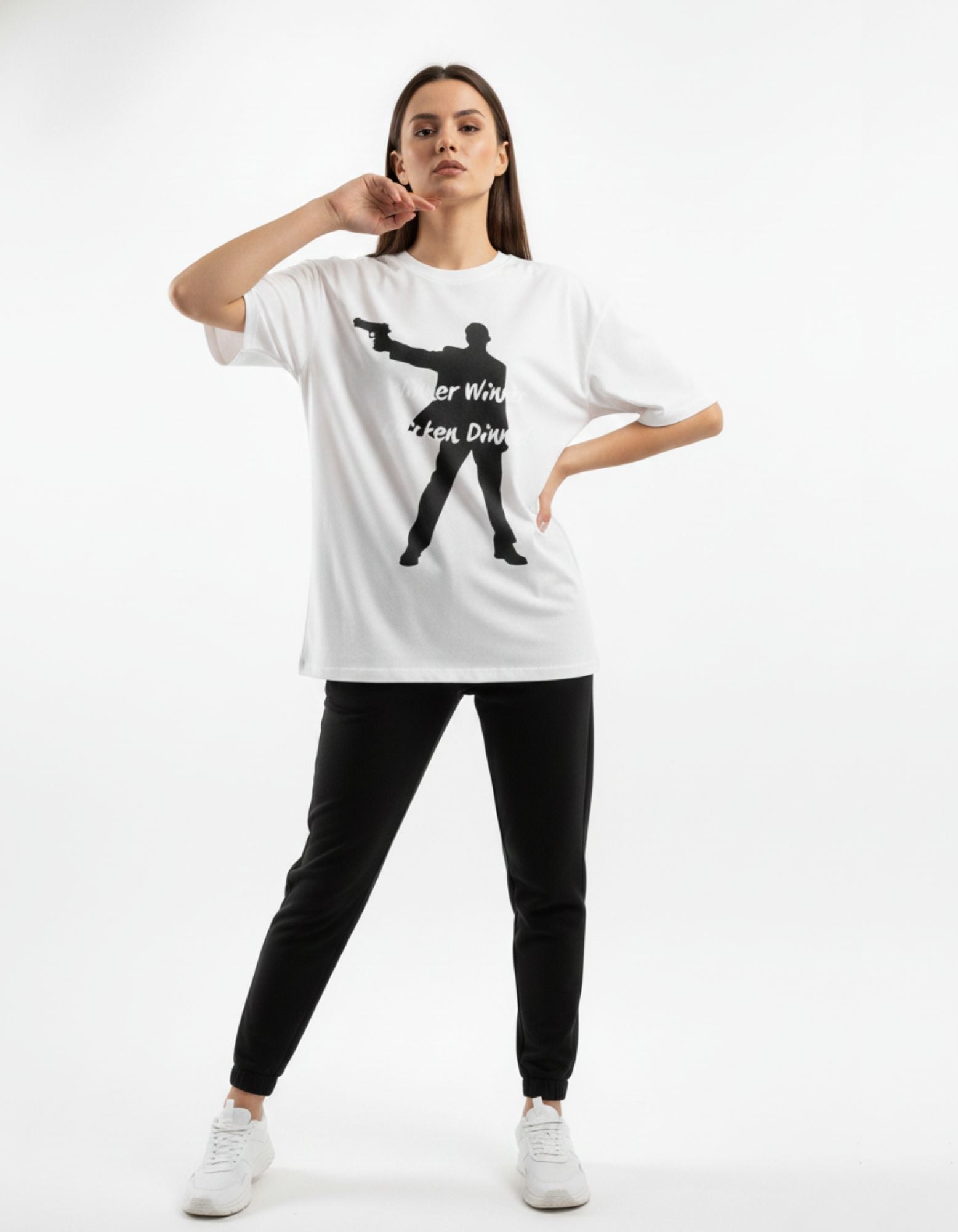 Female model in India wearing a white oversized gaming tee with a "Winner Winner" graphic, perfect for a casual gamer girl aesthetic.