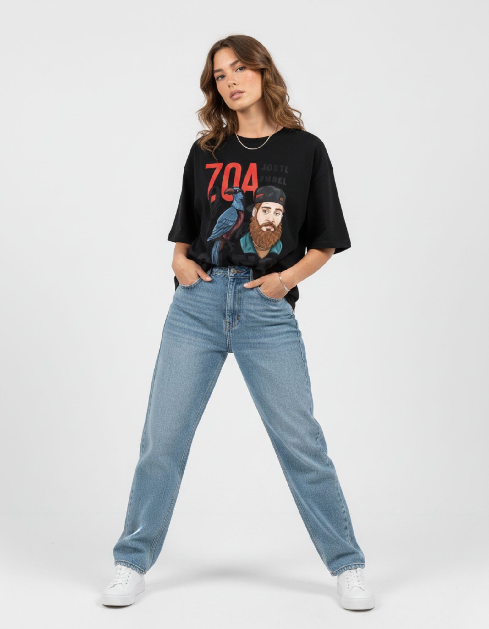 Three-quarter view of a woman in a black graphic oversized tee, highlighting the Gen Z streetwear aesthetic.